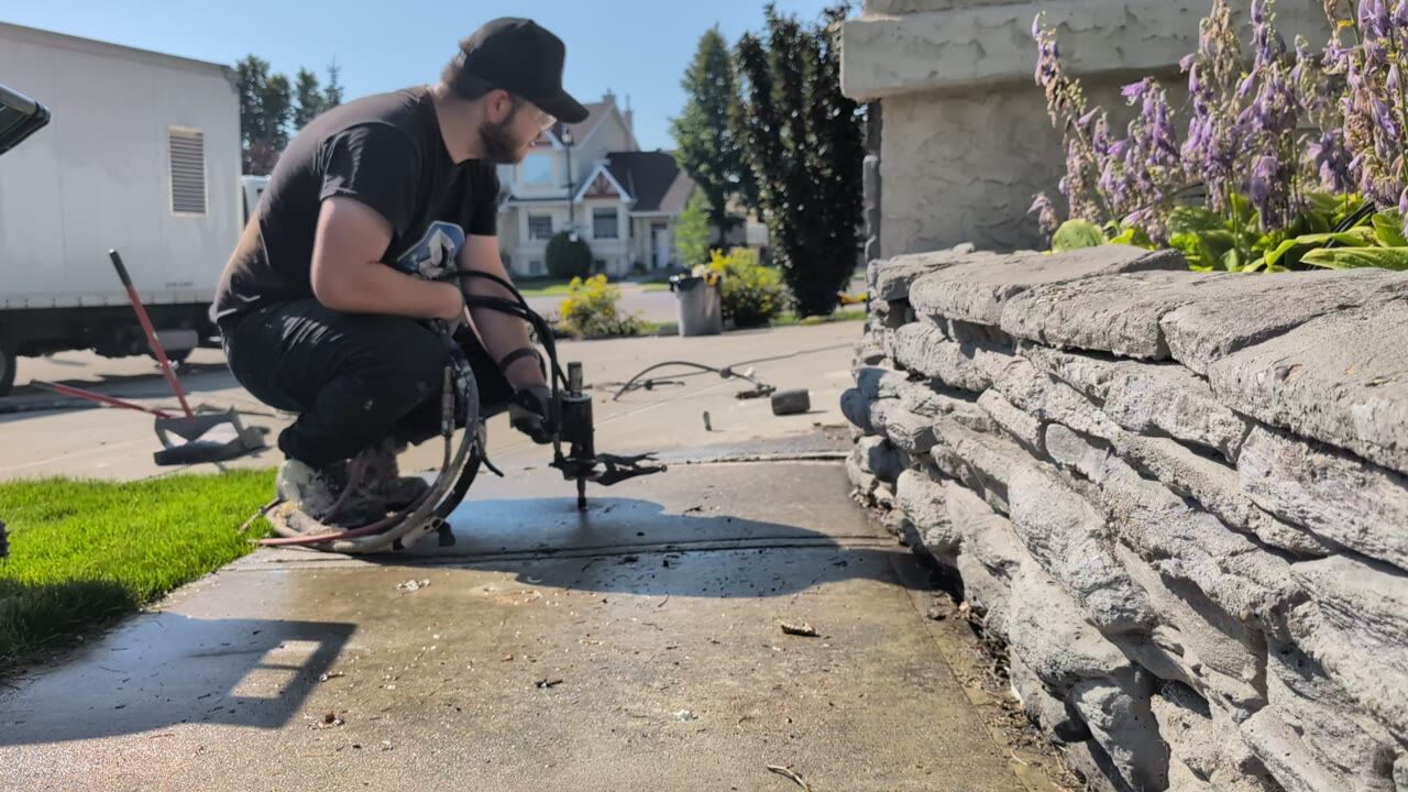 Timelapse of polyurethane foam lifting a concrete slab back to level in Edmonton